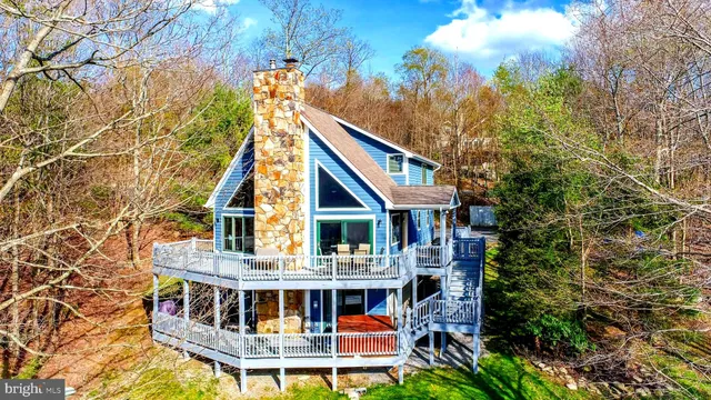 a view of a lake with mountains in the background