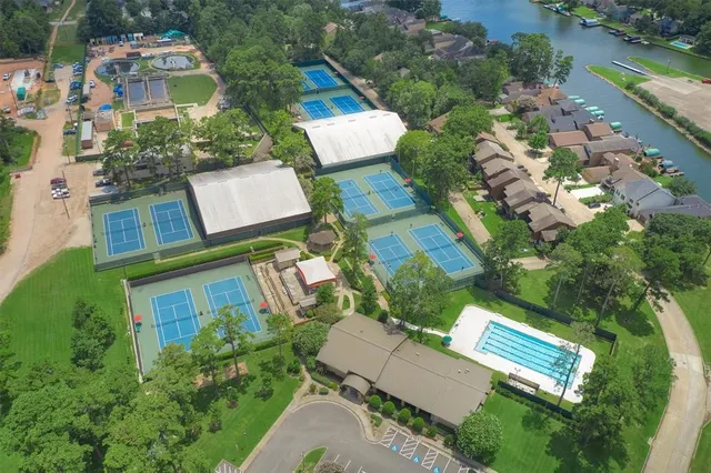 an aerial view of a house with outdoor space