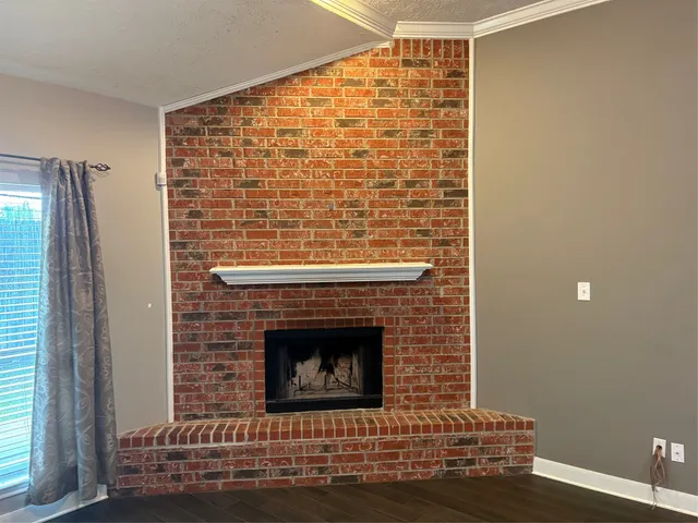 a room with a fireplace