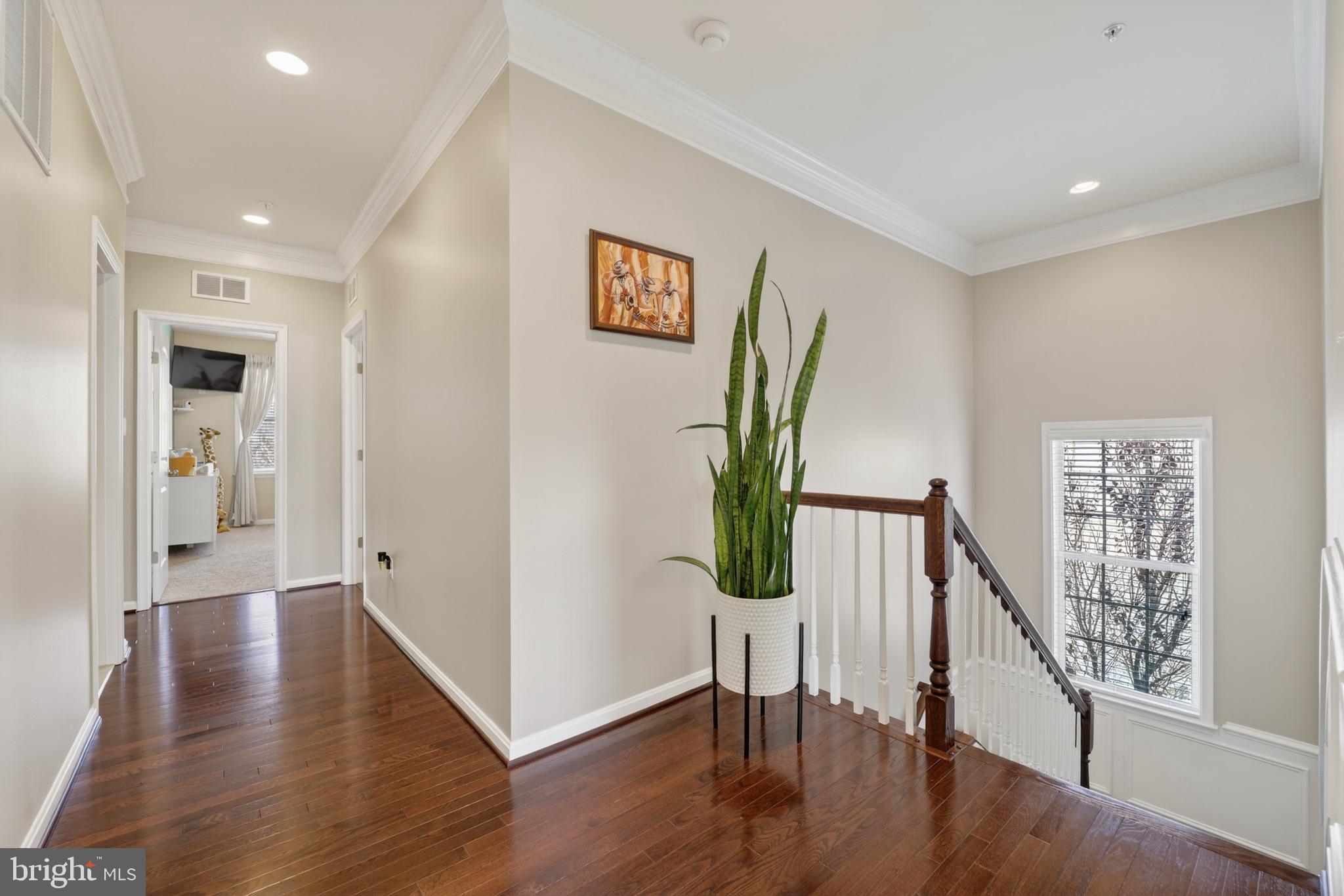 9205 Rice Avenue Lanham, MD 20706 - Photo 22 of 68 a view of entryway with wooden floor and stairs