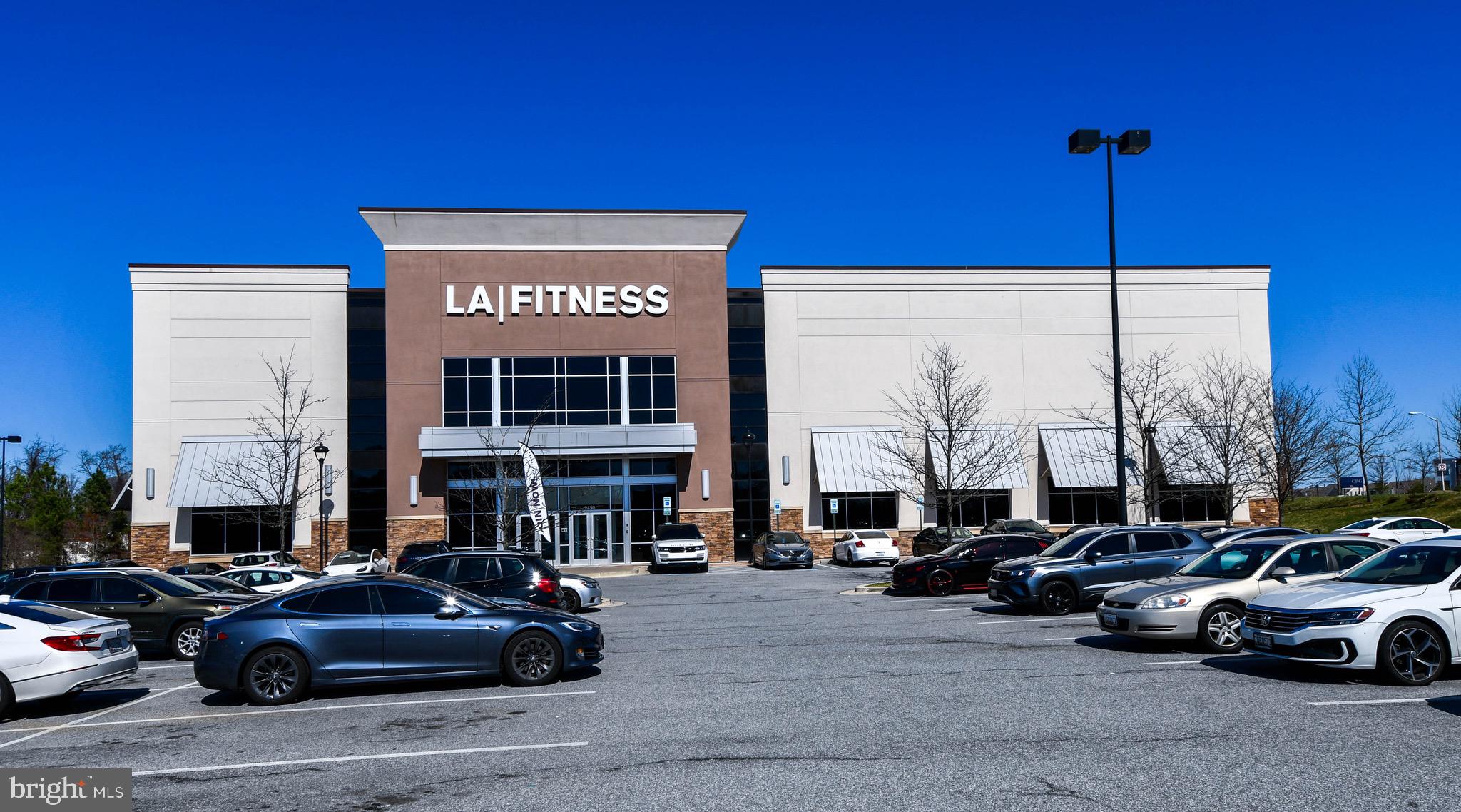 9205 Rice Avenue Lanham, MD 20706 - Photo 59 of 68 a view of a parked cars in front of a building
