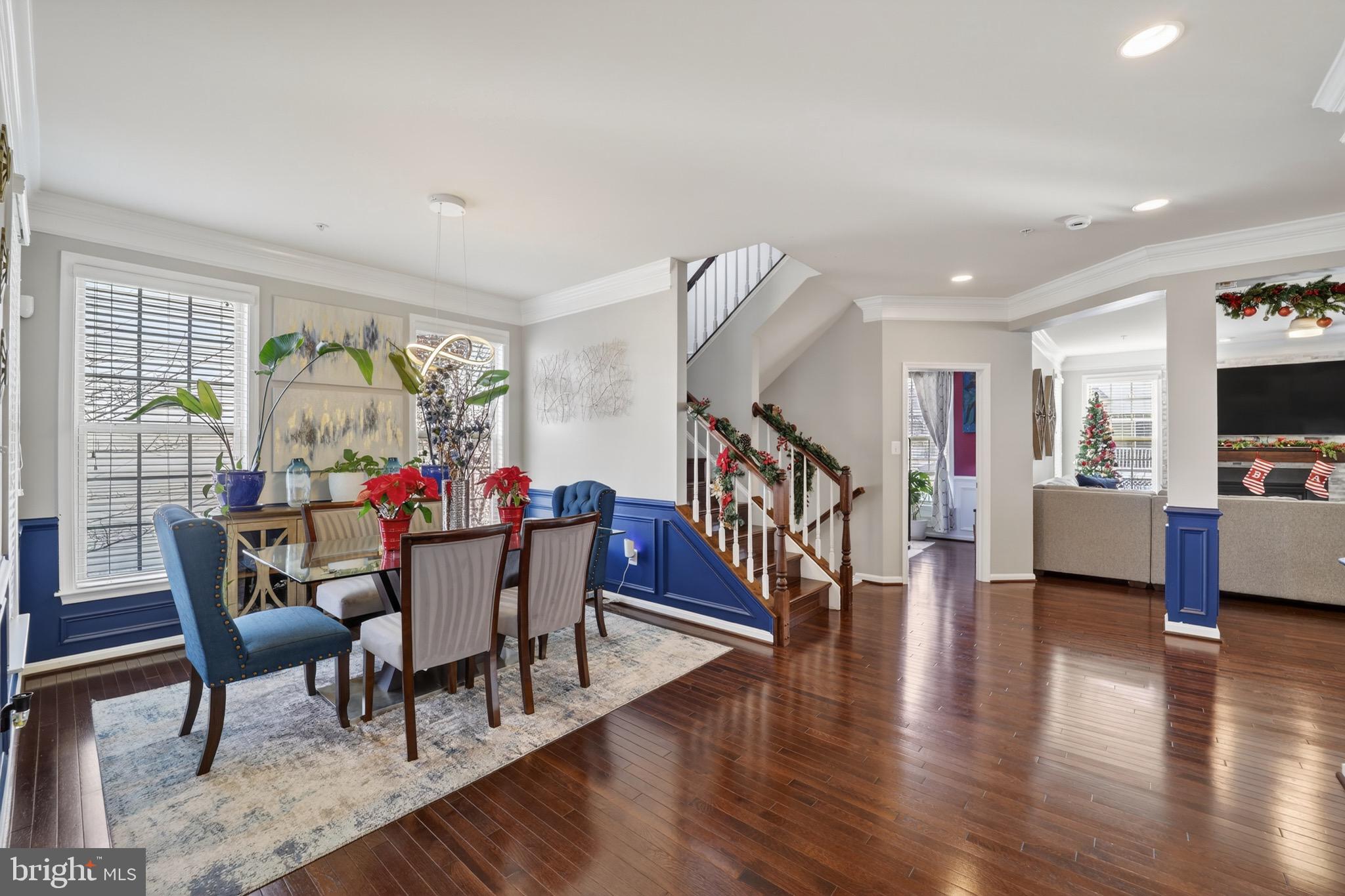 9205 Rice Avenue Lanham, MD 20706 - Photo 6 of 68 a view of a dining room with furniture window and wooden floor