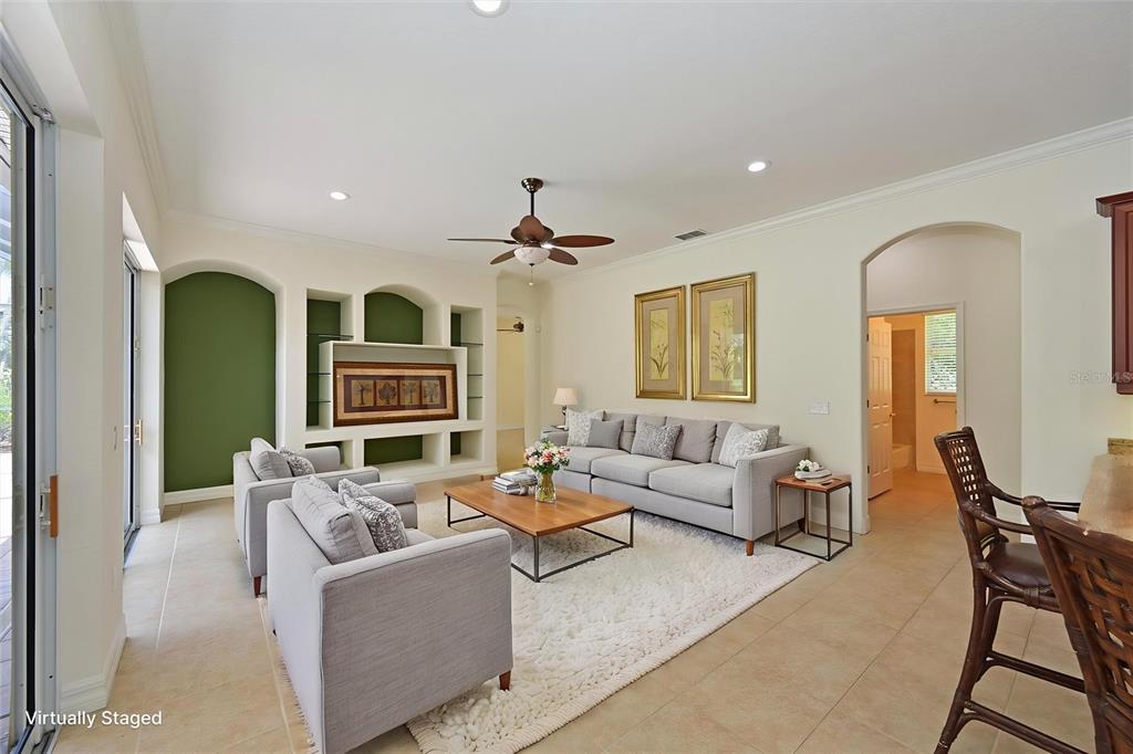 10622 Conch Shell Terrace Bradenton, FL 34212 - Photo 10 of 69 a living room with furniture and a large window