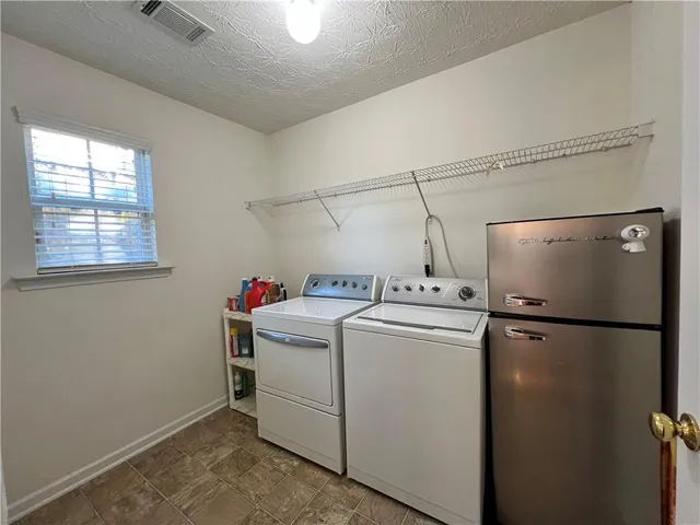 a view of outdoor space with swimming pool and furniture