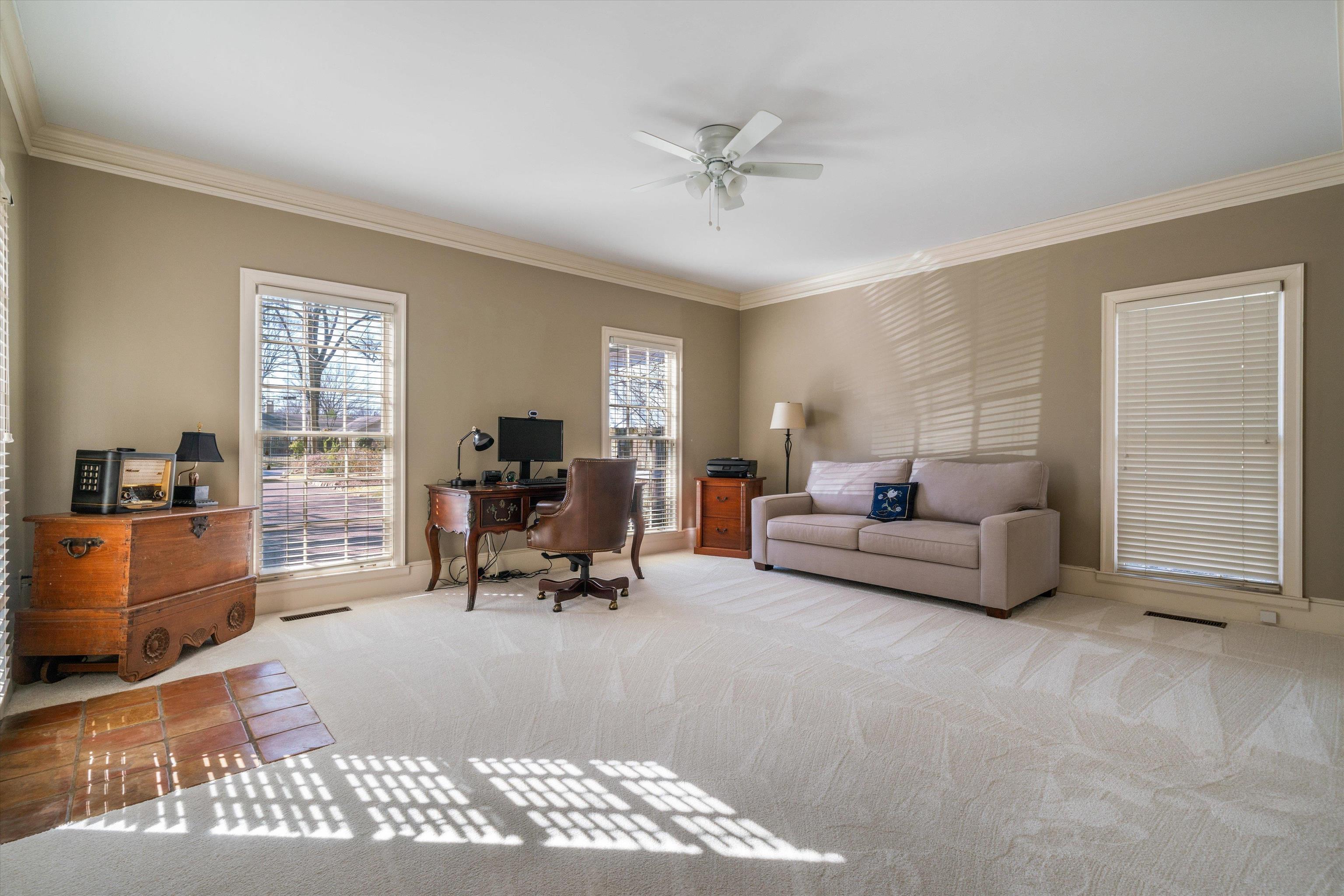 352 Colonial Road Memphis, TN 38117 - Photo 11 of 31 a living room with furniture and a window