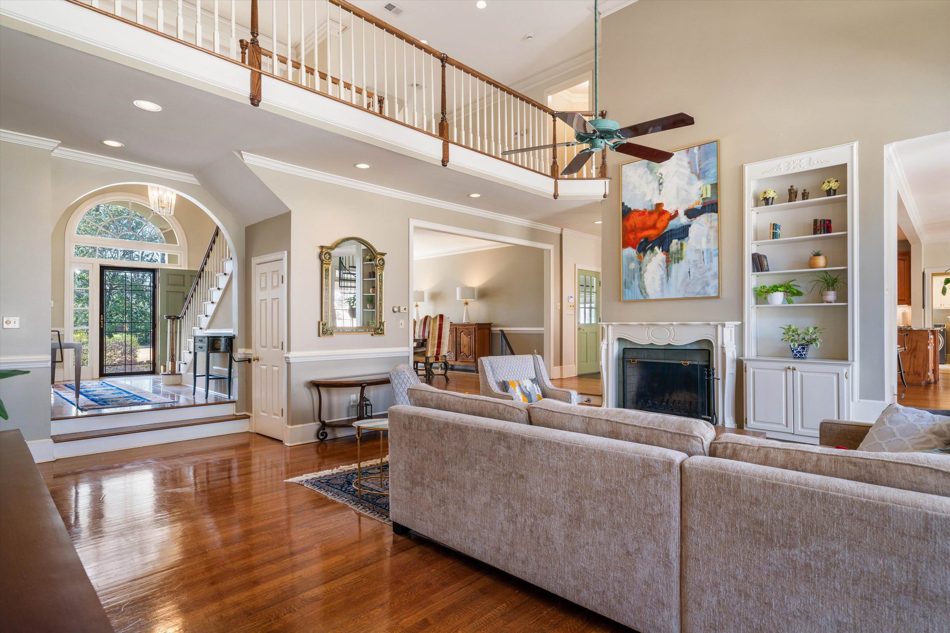 352 Colonial Road Memphis, TN 38117 - Photo 5 of 31 a living room with furniture and a fireplace