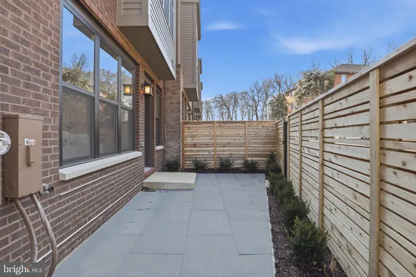 a view of a pathway with a building in the background