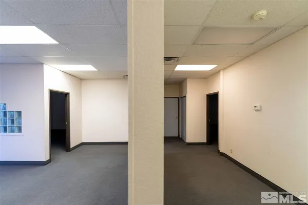 a view of empty room with closet