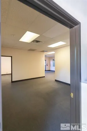 a view of a room and window