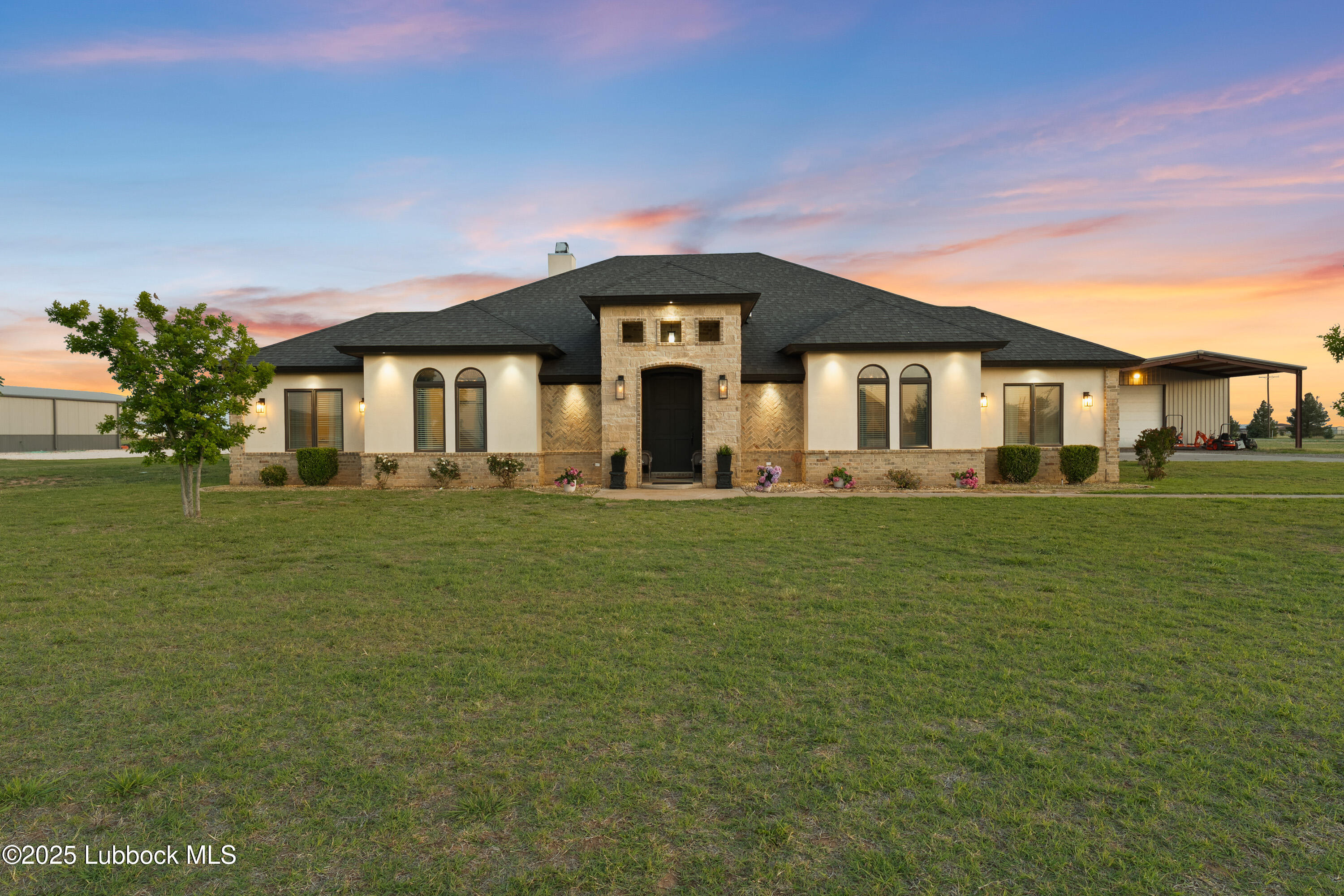5125 County Road 7930 Lubbock, TX 79424 - Photo 1 of 75 a front view of a house with a yard