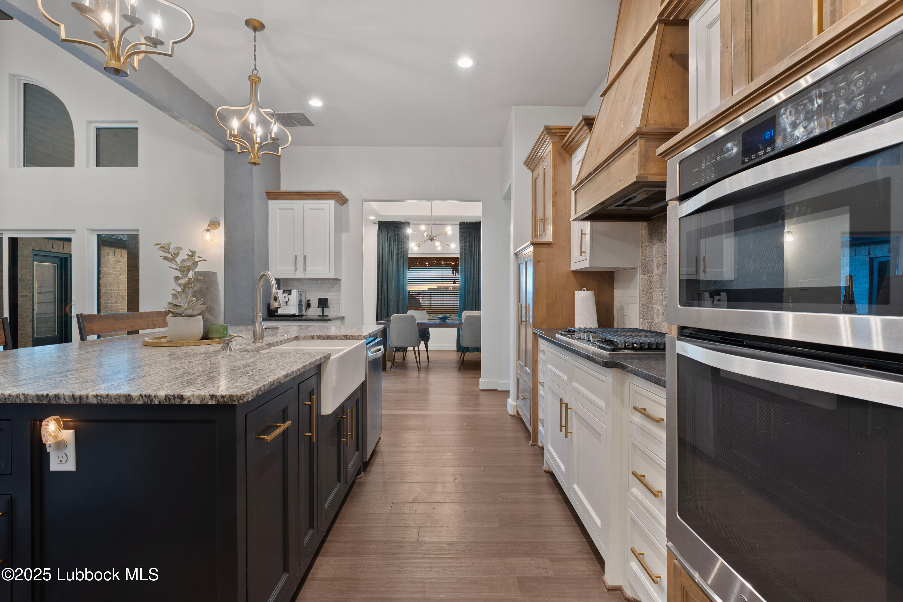 5125 County Road 7930 Lubbock, TX 79424 - Photo 13 of 75 a large kitchen with stainless steel appliances granite countertop lots of counter top space