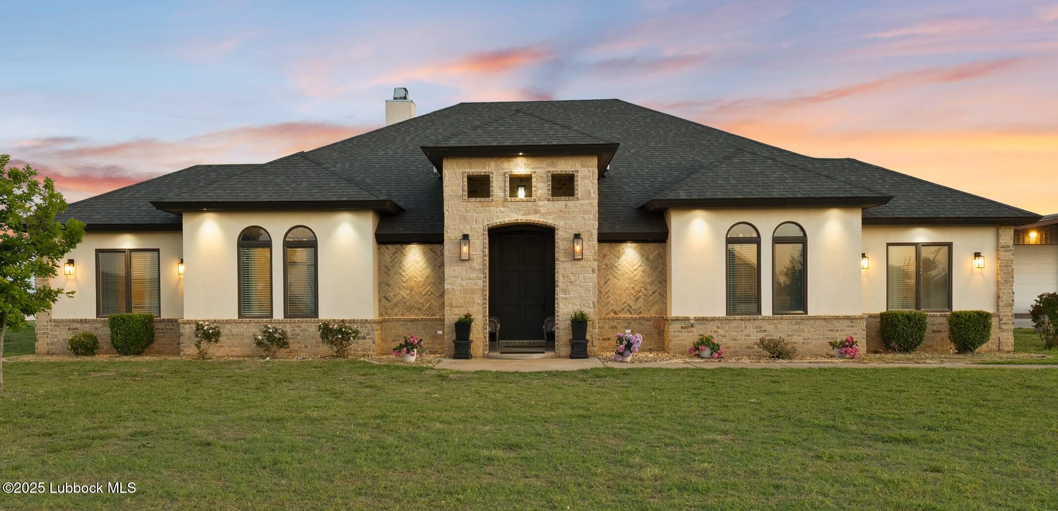 5125 County Road 7930 Lubbock, TX 79424 - Photo 2 of 75 front view of a house with a yard