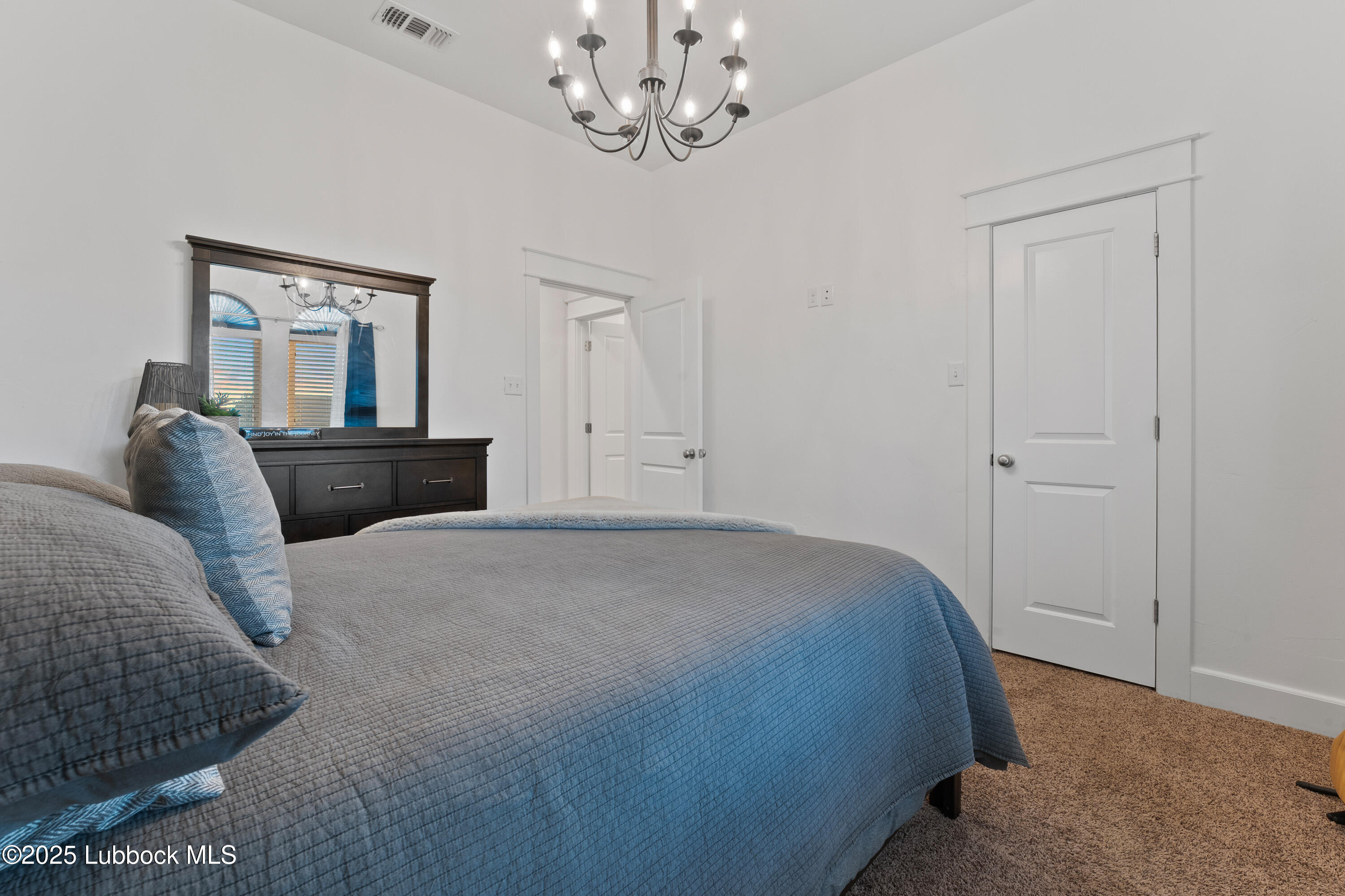 5125 County Road 7930 Lubbock, TX 79424 - Photo 34 of 75 a bedroom with a bed and window