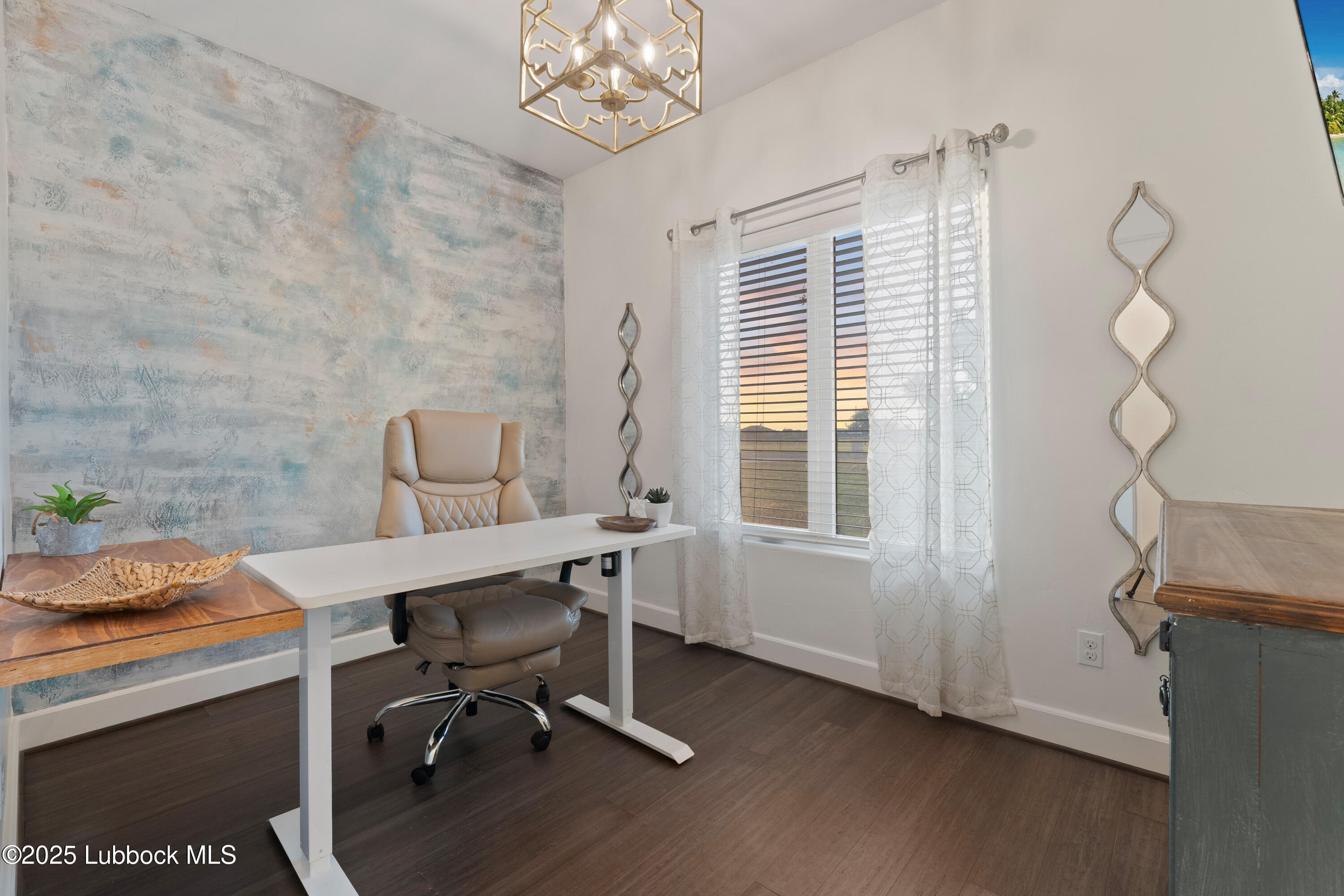 5125 County Road 7930 Lubbock, TX 79424 - Photo 39 of 75 a view of a workspace with furniture and a window