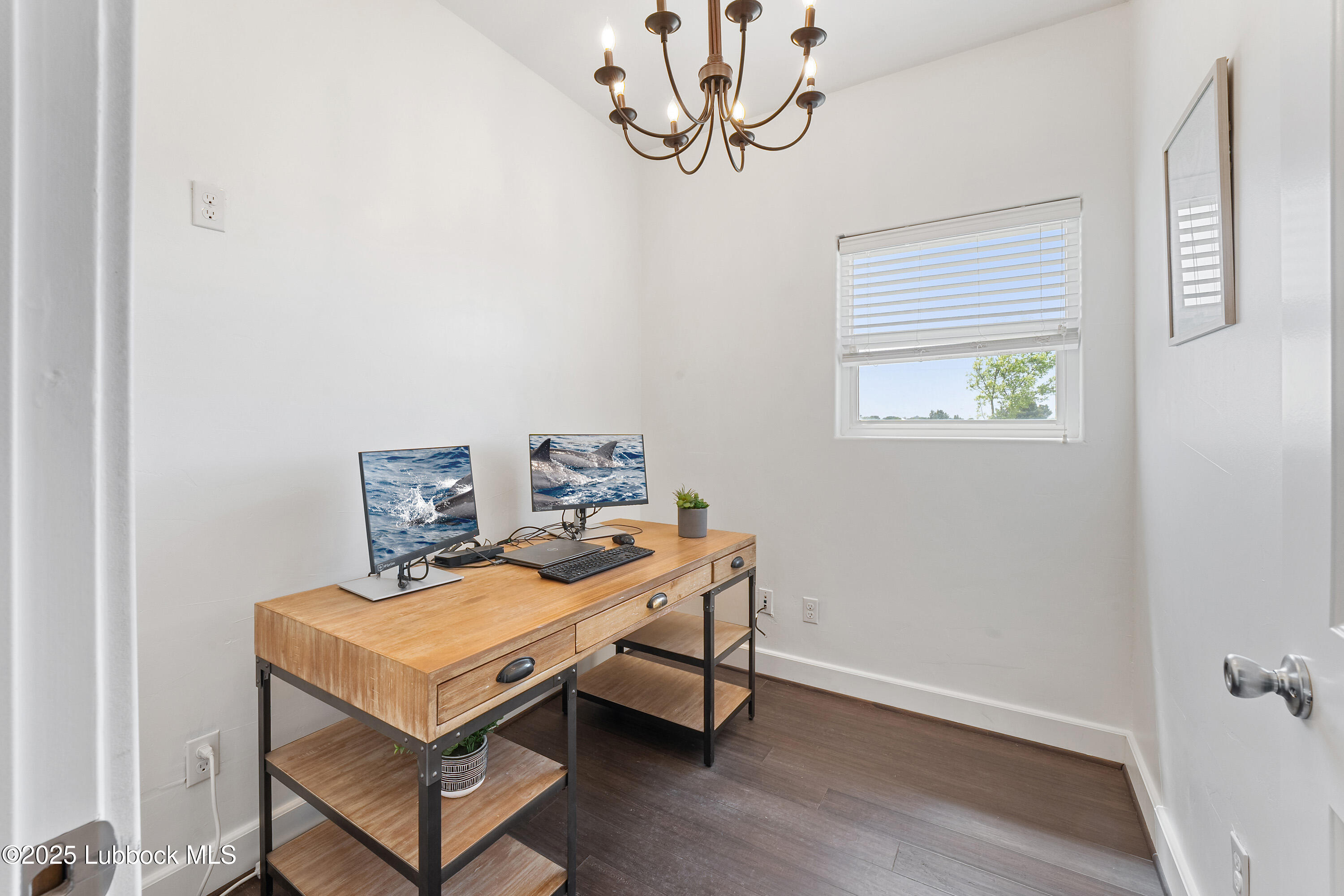 5125 County Road 7930 Lubbock, TX 79424 - Photo 40 of 75 a bedroom with a bed and a table