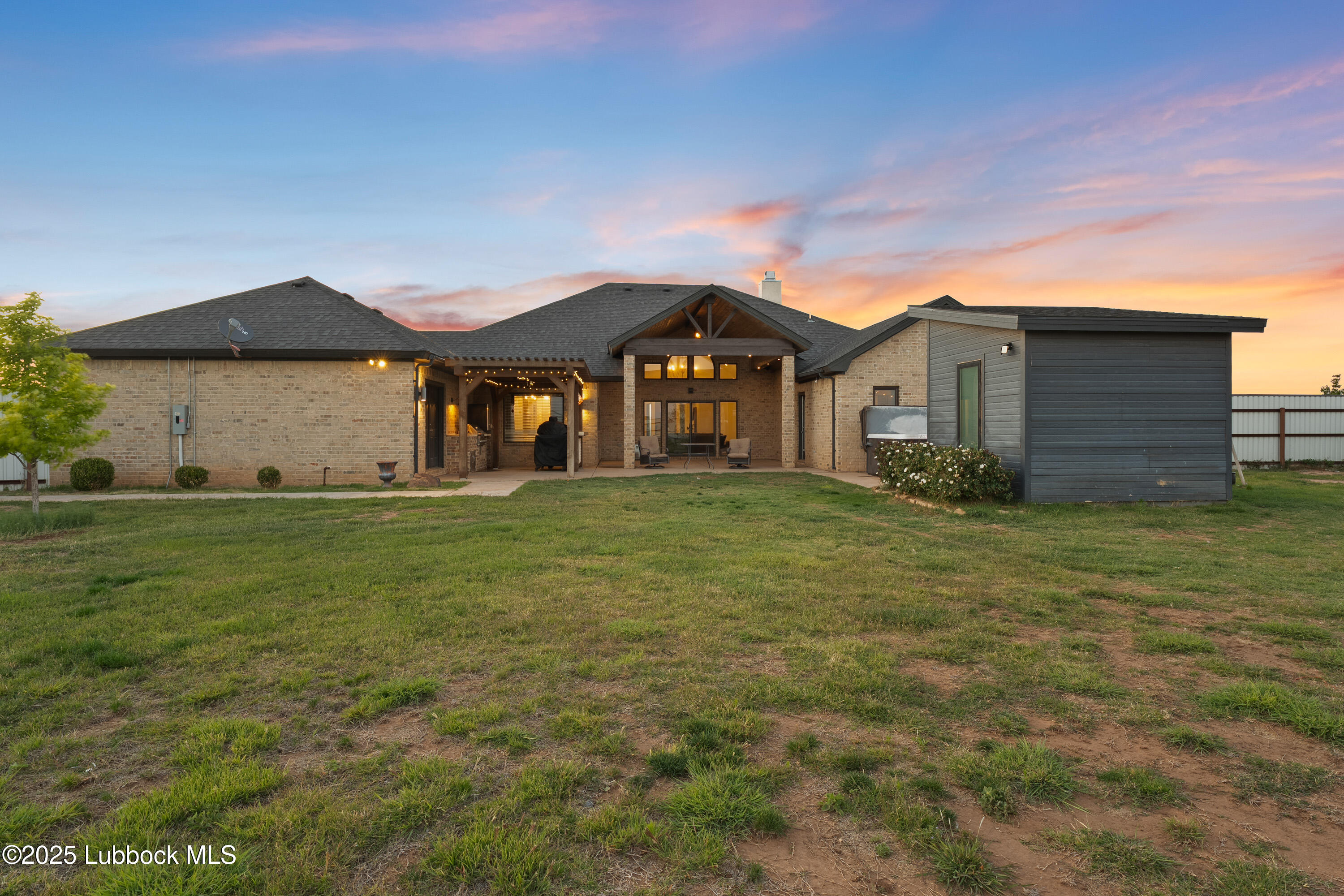 5125 County Road 7930 Lubbock, TX 79424 - Photo 46 of 75 a front view of a house with a yard