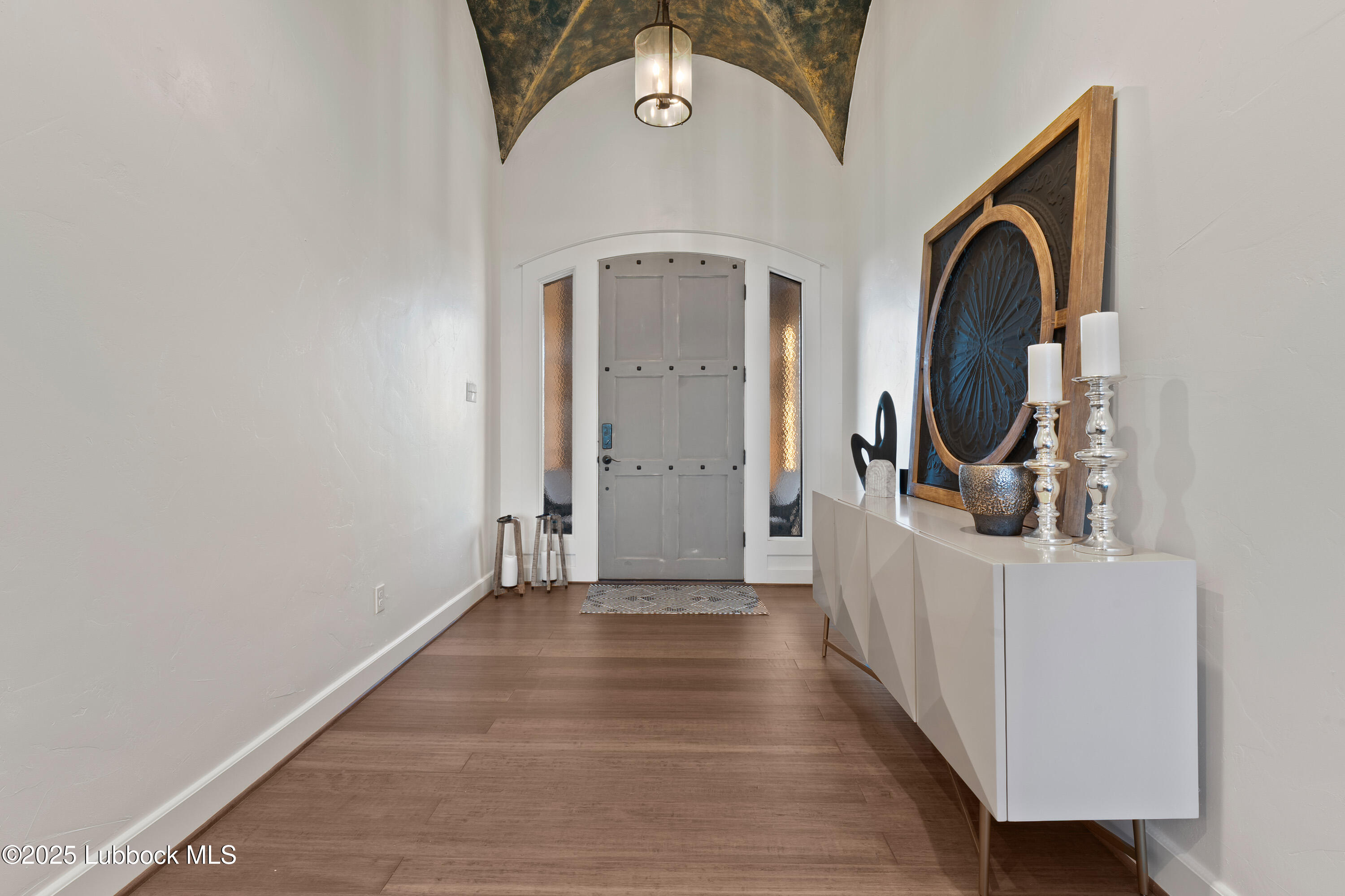5125 County Road 7930 Lubbock, TX 79424 - Photo 5 of 75 a view of a hallway with washer and dryer