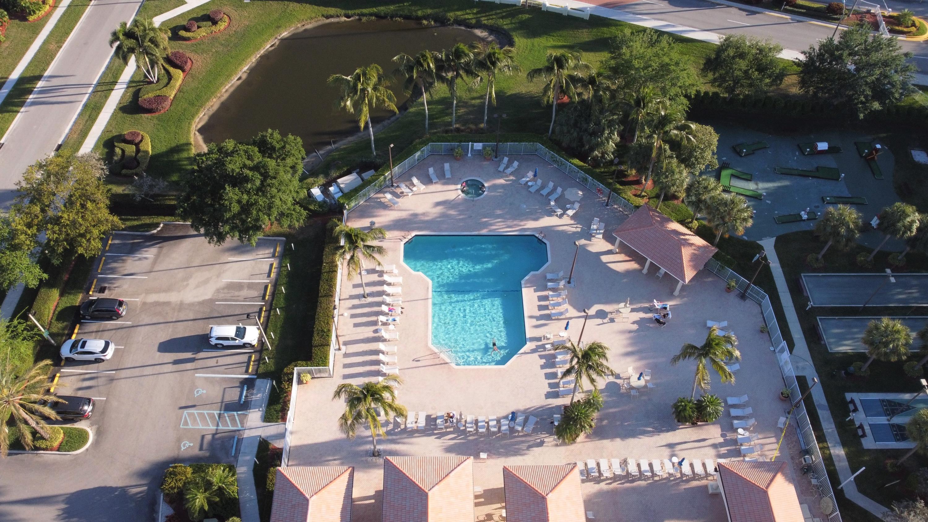 6071 Caladium Road Delray Beach, FL 33484 - Photo 33 of 36 27 Community Pool 6071 Caladium