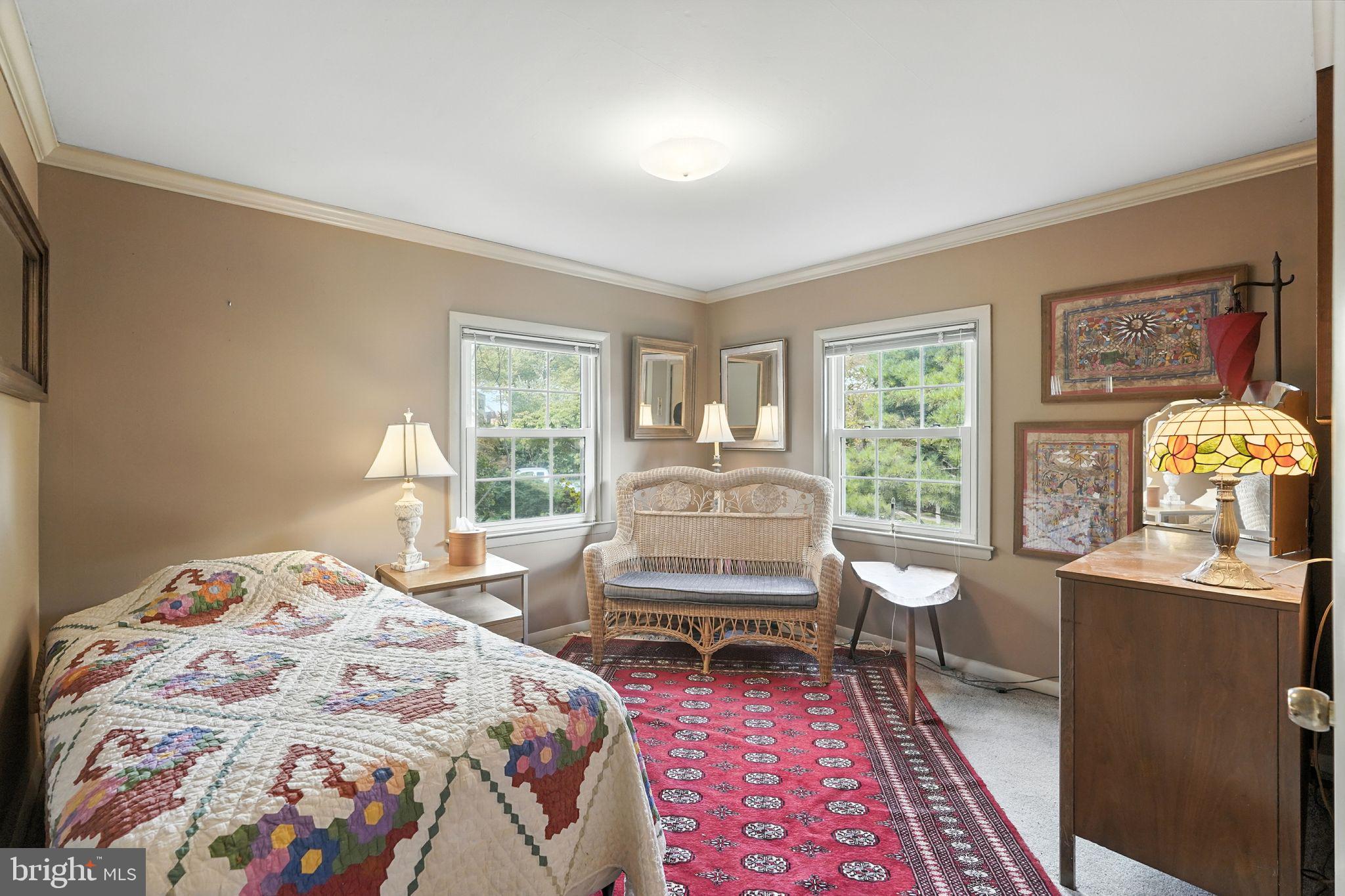 8420 Chippewa Road Philadelphia, PA 19128 - Photo 13 of 30 a bedroom with a bed and wooden floor