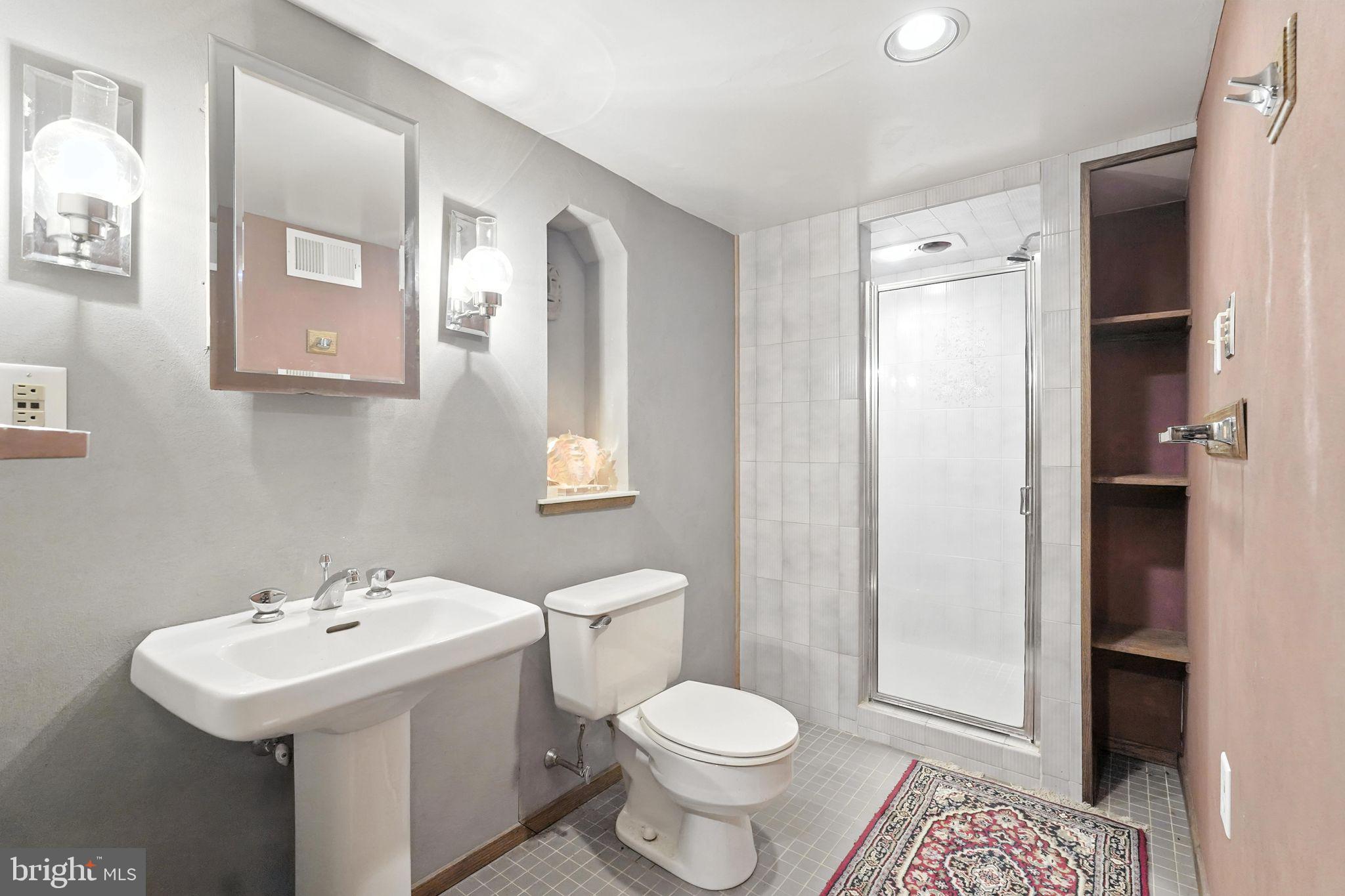 8420 Chippewa Road Philadelphia, PA 19128 - Photo 20 of 30 a bathroom with a sink toilet and shower