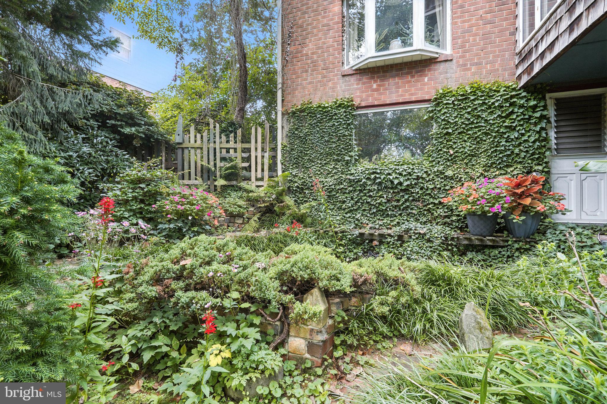 8420 Chippewa Road Philadelphia, PA 19128 - Photo 23 of 30 a view of a house with a flower garden