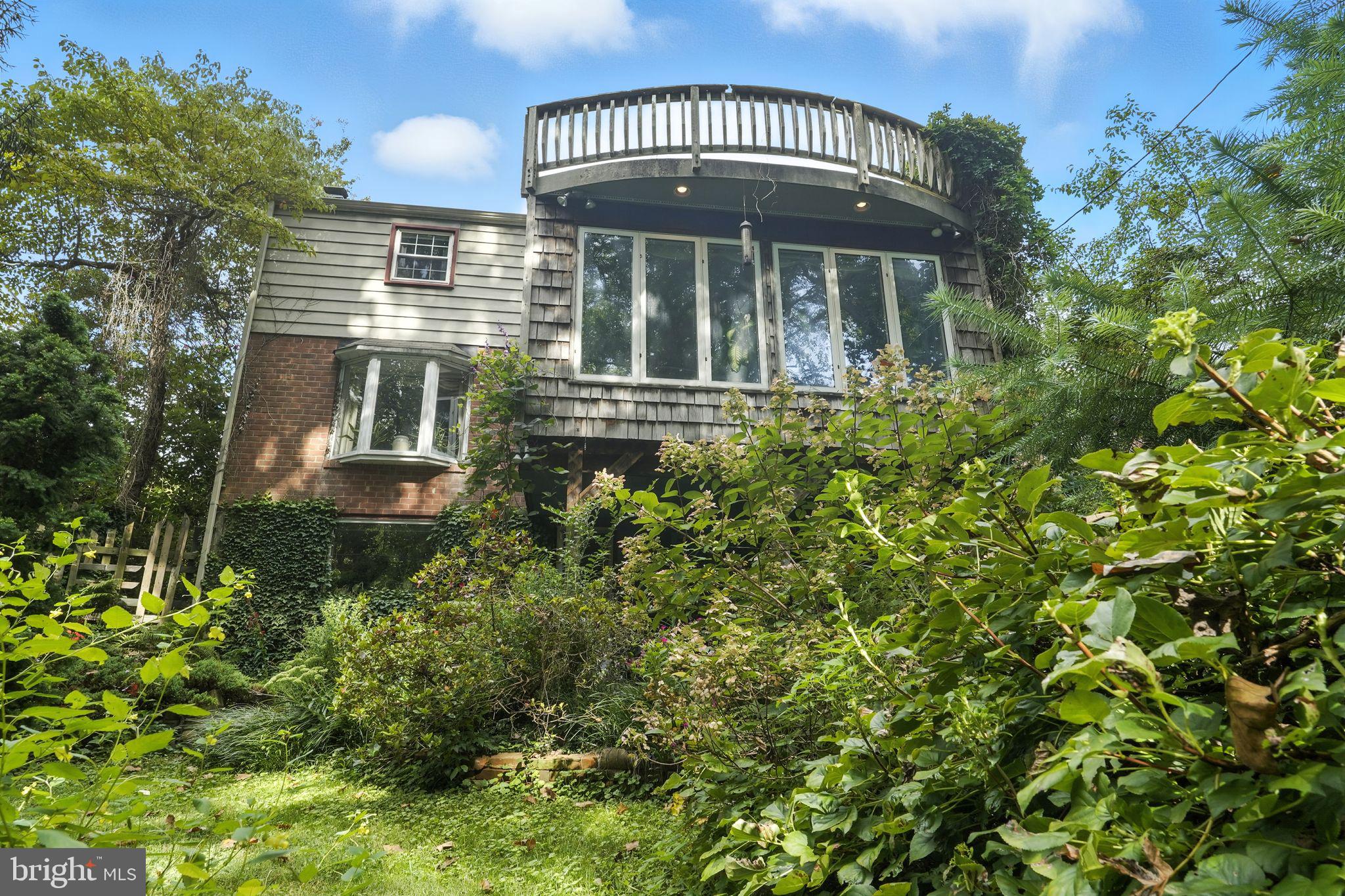 8420 Chippewa Road Philadelphia, PA 19128 - Photo 27 of 30 a front view of a house with a yard