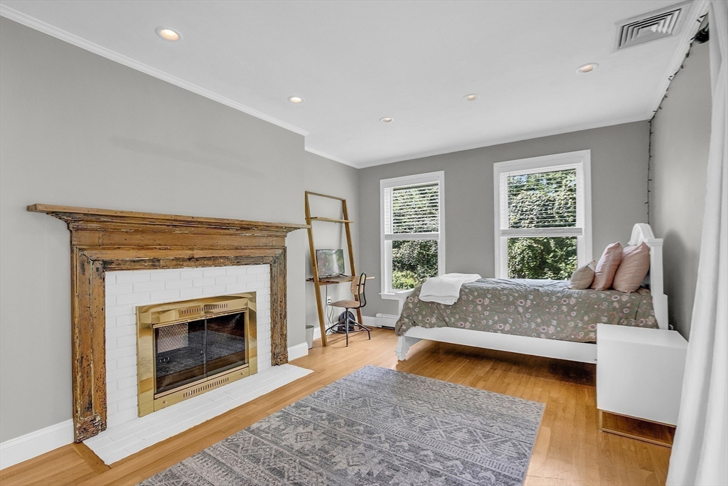 71B South Road Pepperell, MA 01463 - Photo 20 of 42 a living room with furniture and a fireplace