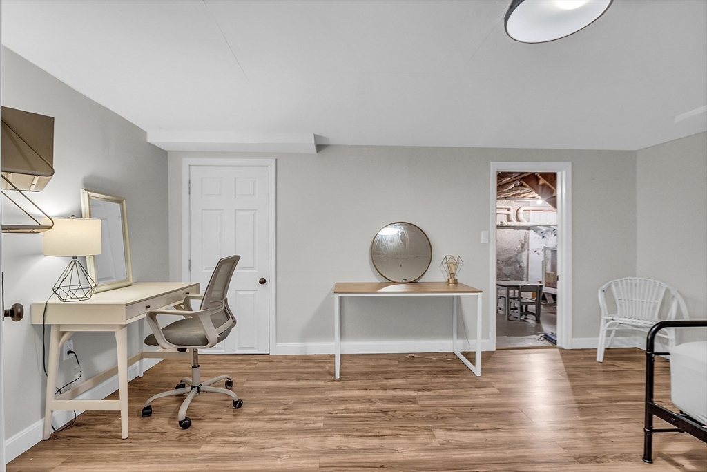 71B South Road Pepperell, MA 01463 - Photo 30 of 42 a view of a workspace with wooden floor