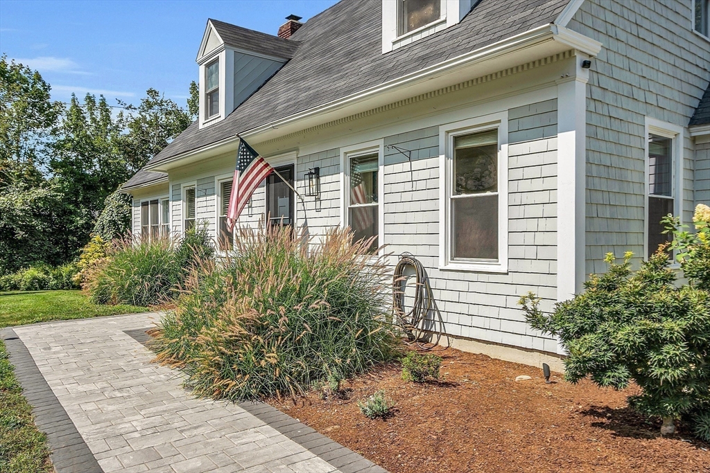 71B South Road Pepperell, MA 01463 - Photo 3 of 42 a front view of a house with garden