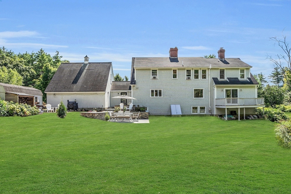 71B South Road Pepperell, MA 01463 - Photo 38 of 42 a front view of a house with a garden