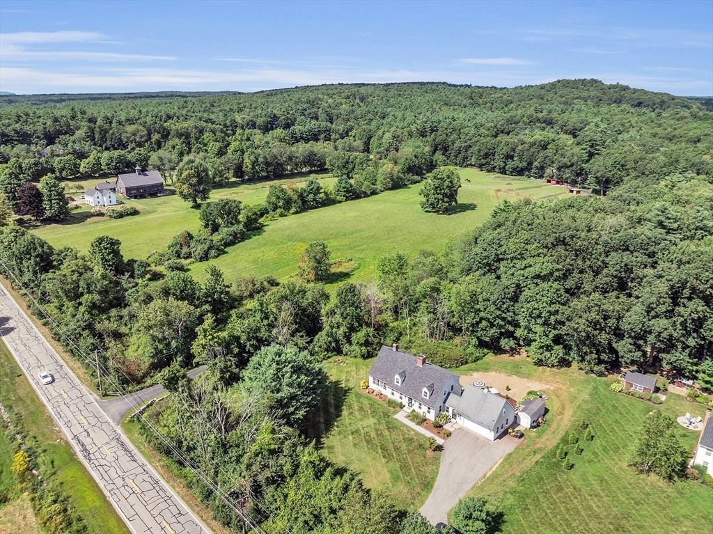 71B South Road Pepperell, MA 01463 - Photo 39 of 42 a view of a lake with green field
