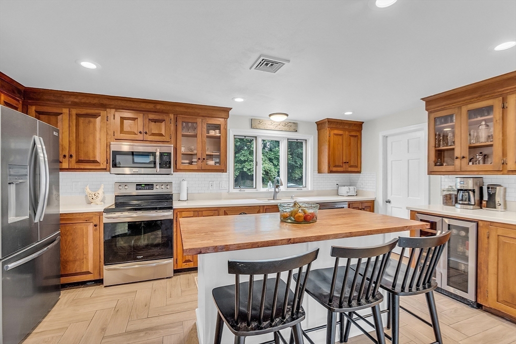 71B South Road Pepperell, MA 01463 - Photo 6 of 42 a view of a dining room with furniture window and outside view