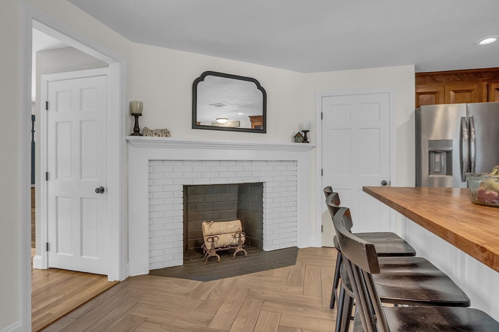 71B South Road Pepperell, MA 01463 - Photo 7 of 42 a living room with furniture and a fireplace