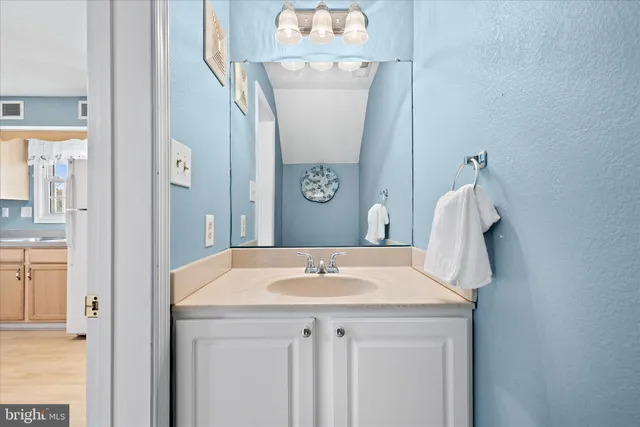 a sink with a mirror