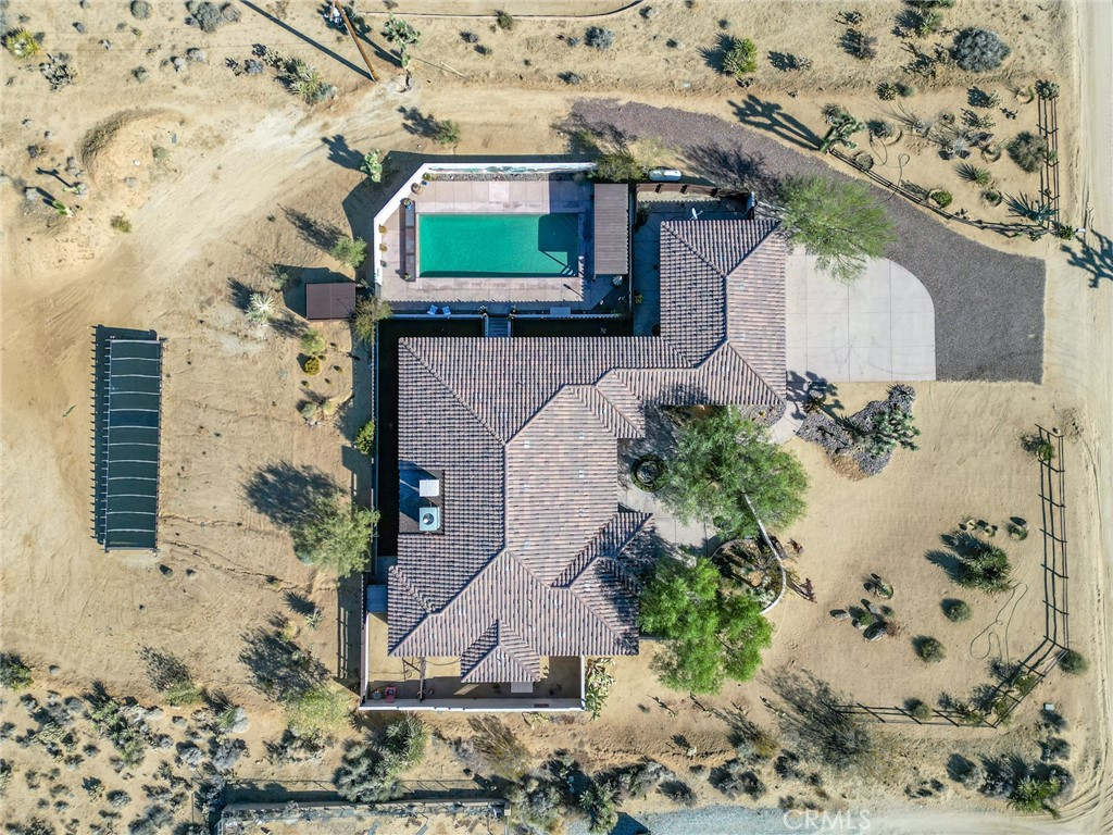 61138 Onaga Trail Joshua Tree, CA 92252 - Photo 20 of 20 an aerial view of a house with a yard