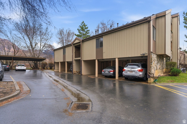 1175 Canyon Road, Unit 77 Ogden, UT 84404 - Photo 12 of 16 View of building exterior with covered parking