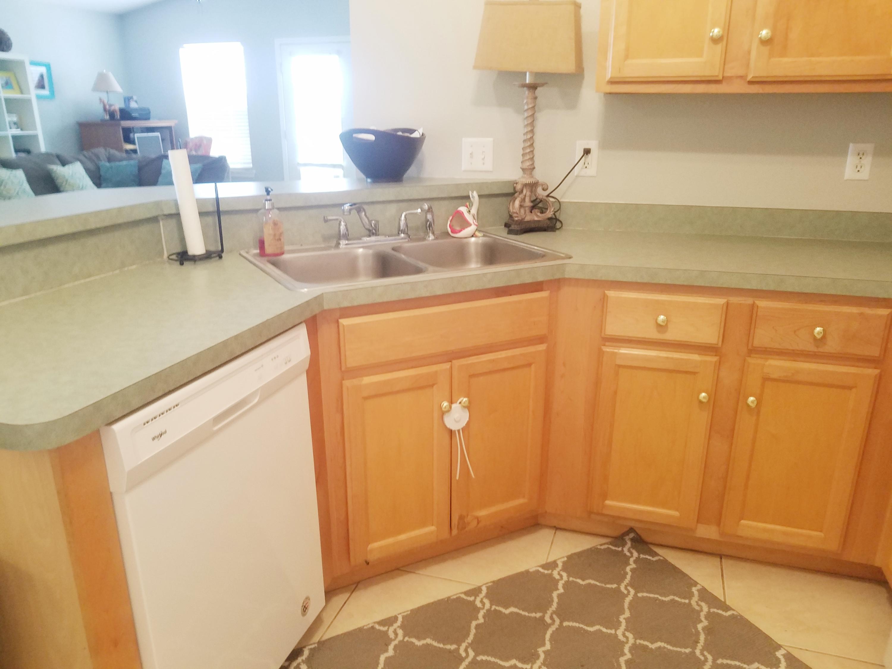 52 Green Island Way Miramar Beach, FL 32550 - Photo 12 of 27 a kitchen with a sink and cabinets