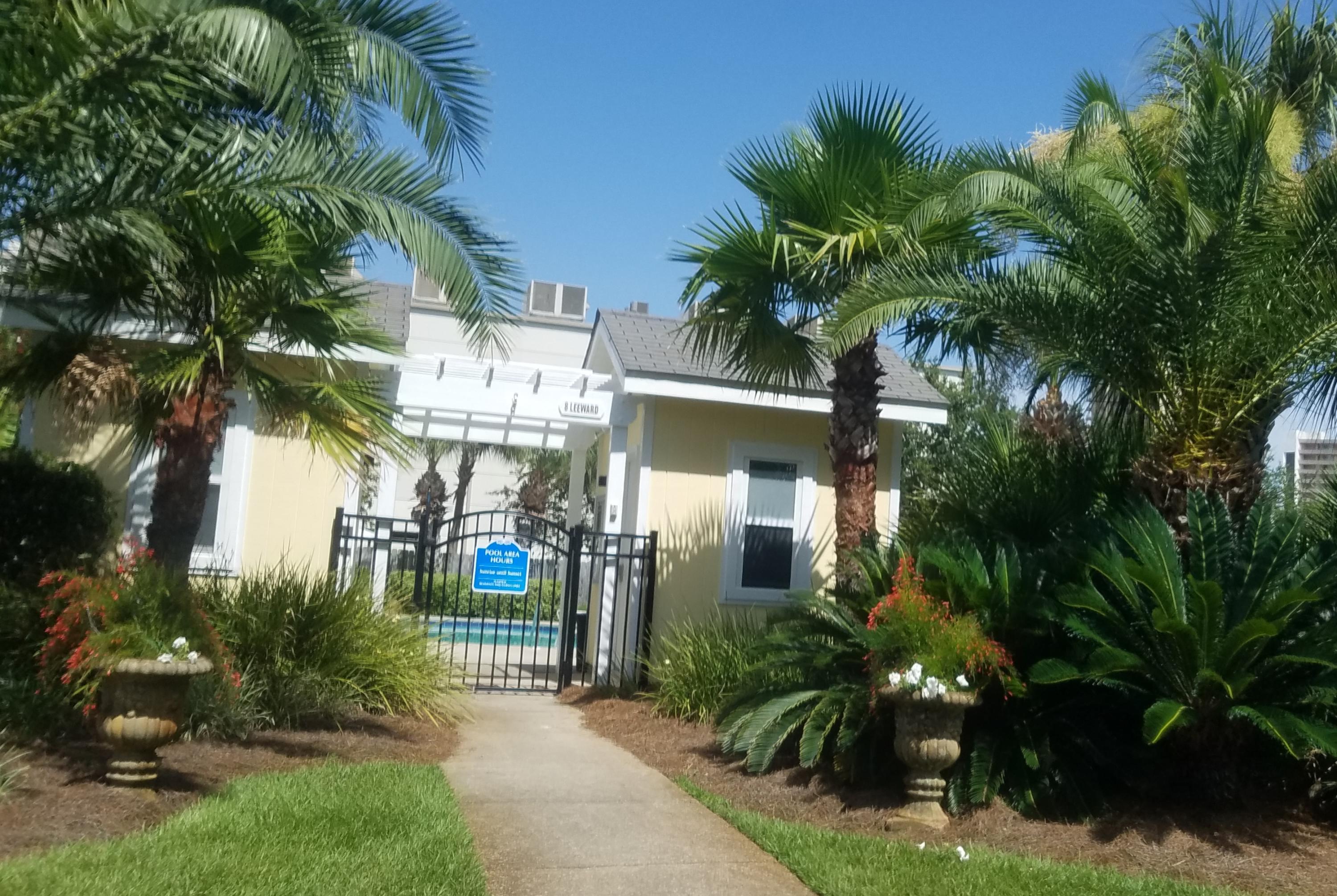 52 Green Island Way Miramar Beach, FL 32550 - Photo 17 of 27 a front view of a house with a garden