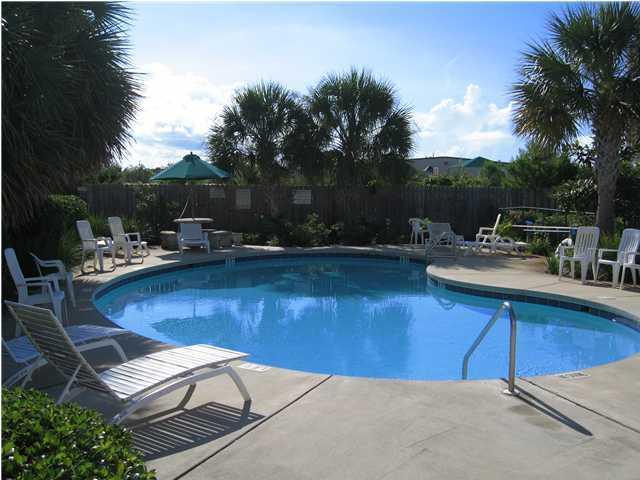 52 Green Island Way Miramar Beach, FL 32550 - Photo 18 of 27 a view of a patio with chairs and plants