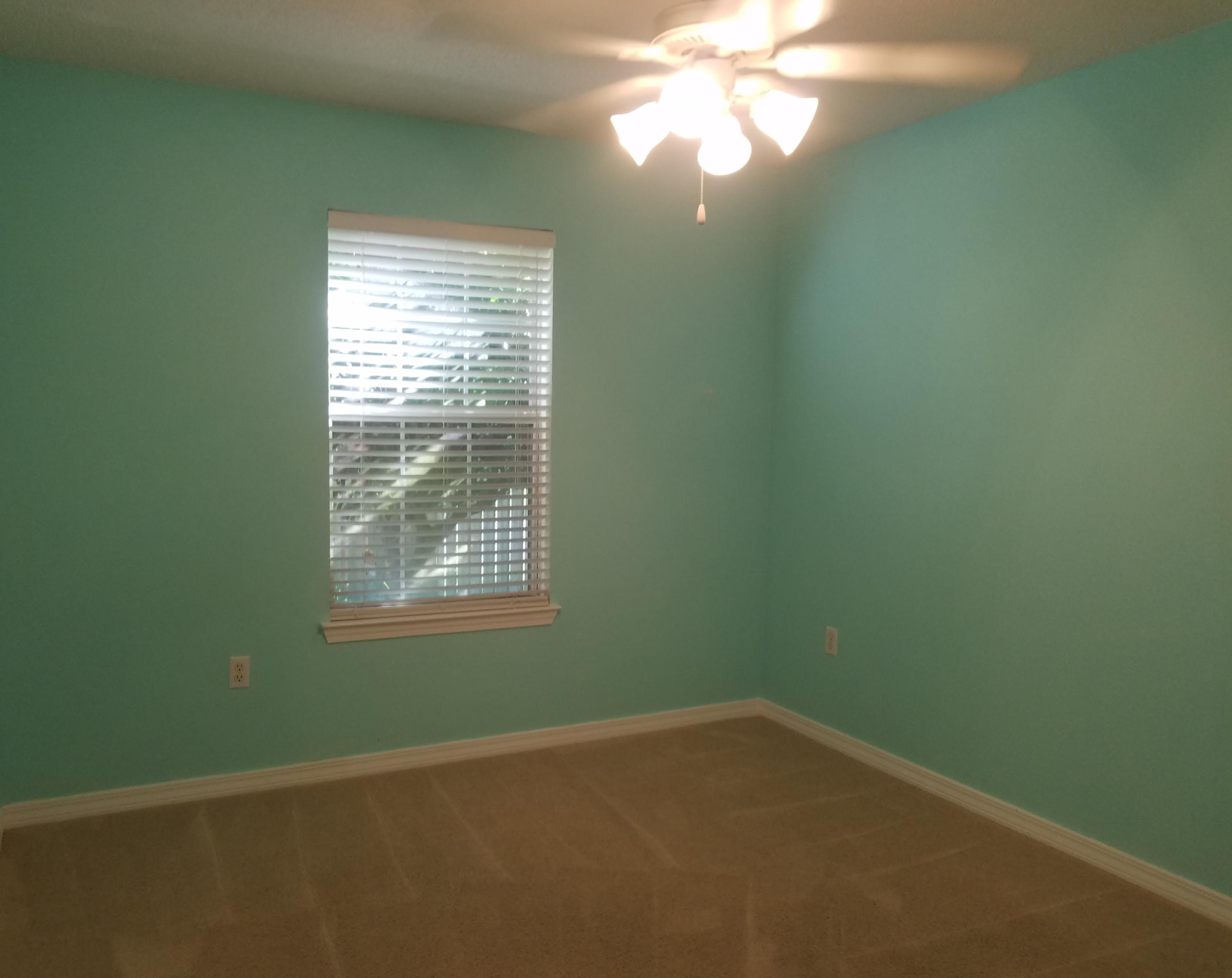 52 Green Island Way Miramar Beach, FL 32550 - Photo 23 of 27 a view of an empty room with a window and a fan