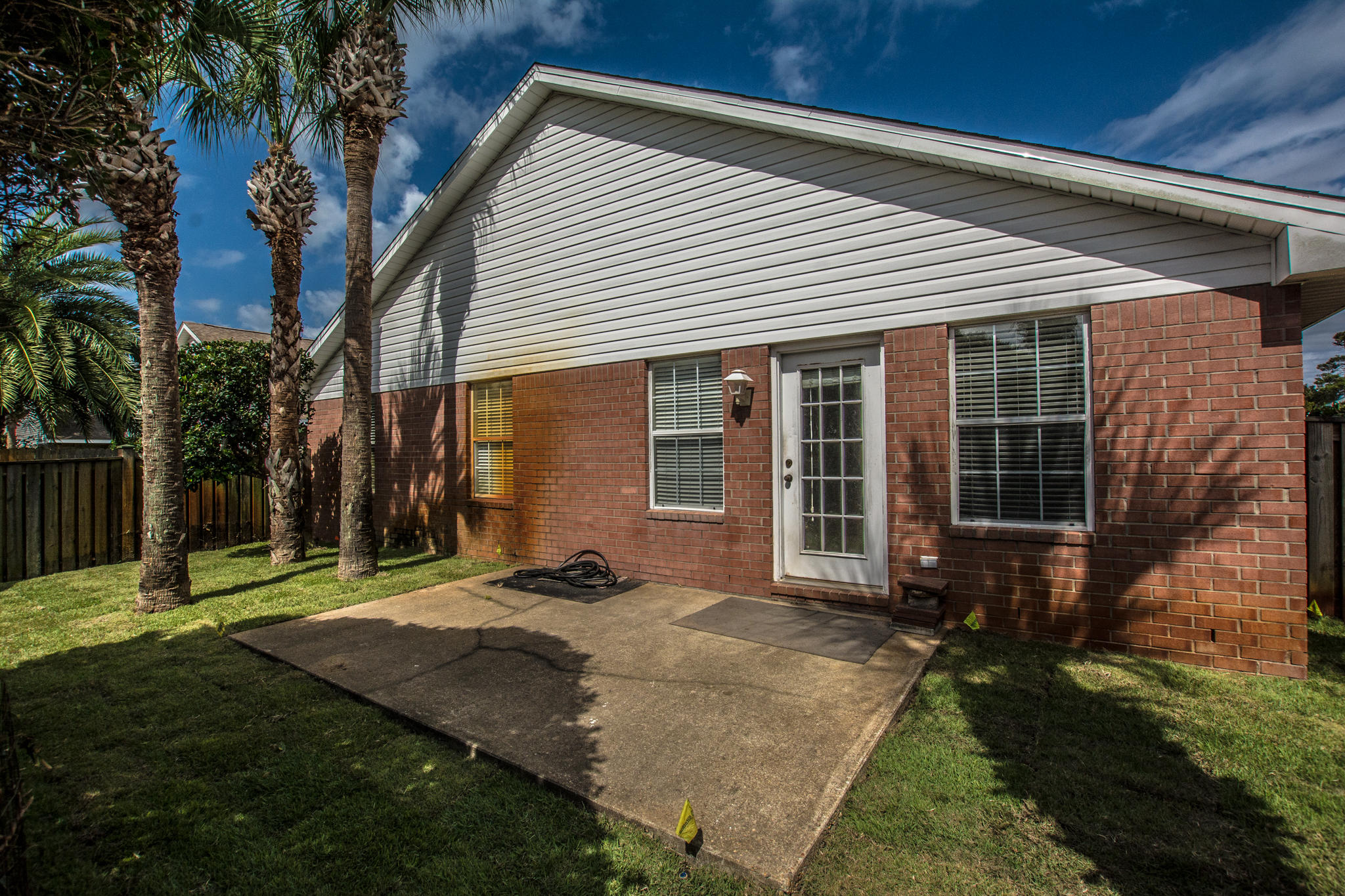 52 Green Island Way Miramar Beach, FL 32550 - Photo 4 of 27 a front view of a house with a yard