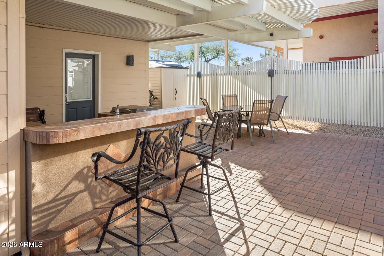 17200 West Bell Road, Unit 1784 Surprise, AZ 85374 - Photo 19 of 25 a view of a dining room with furniture