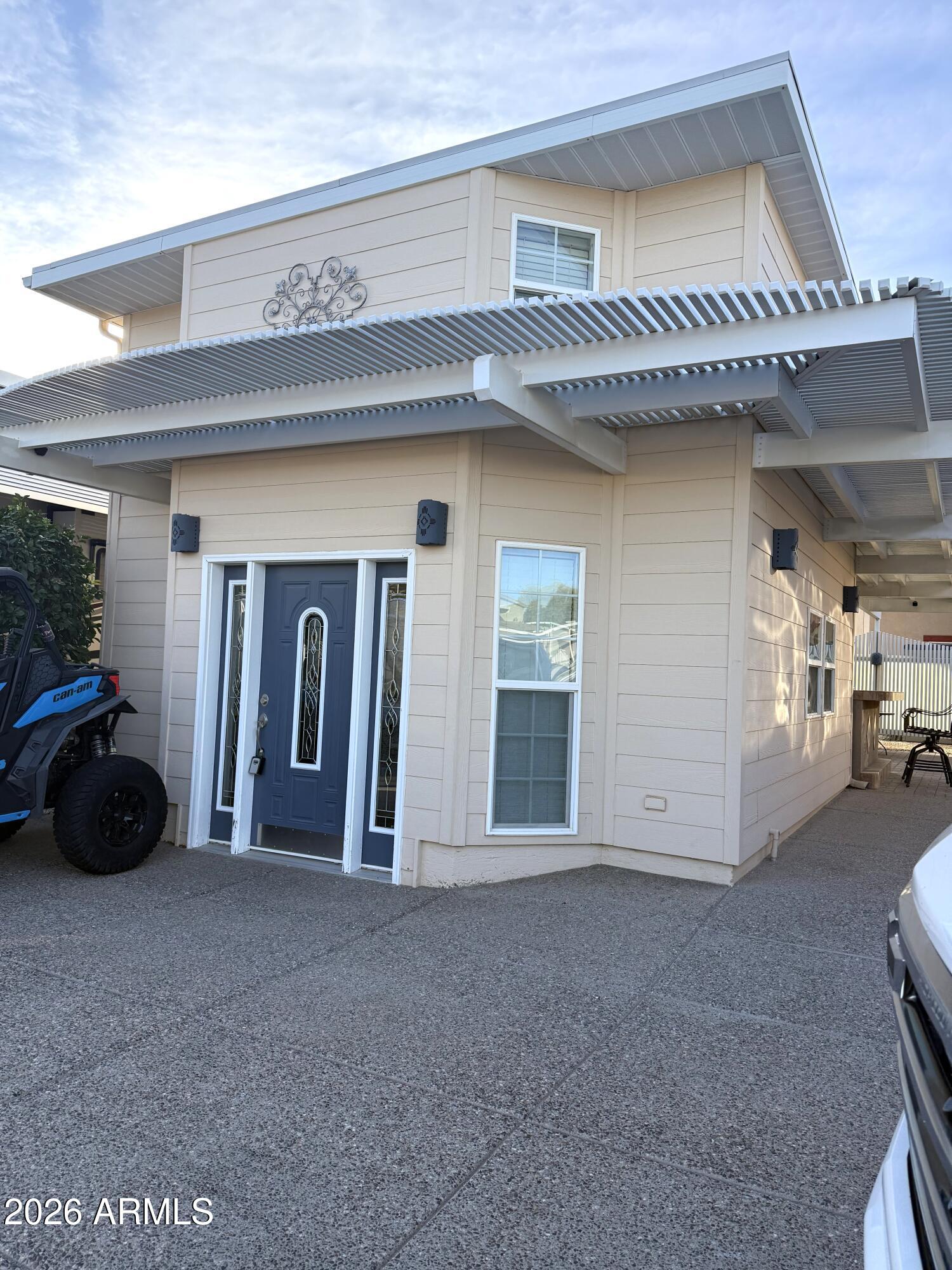17200 West Bell Road, Unit 1784 Surprise, AZ 85374 - Photo 24 of 25 a view of a livingroom with closet