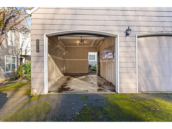 a view of a porch with a small yard
