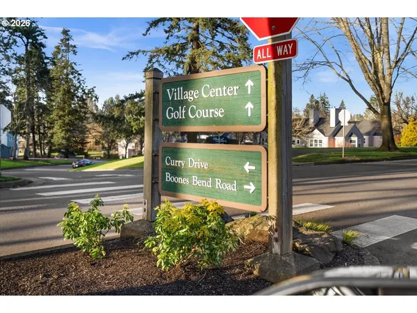 an aerial view of multiple house with a lake view