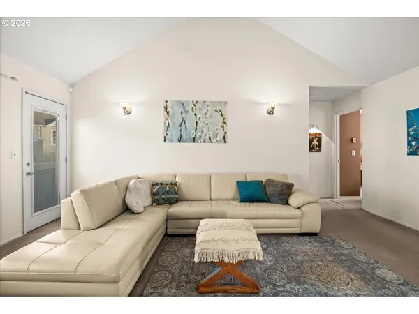 a living room with furniture and a couch