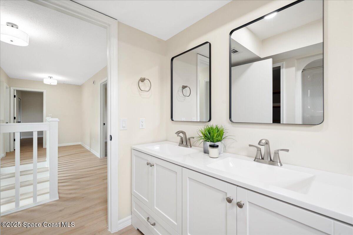 6315 Anchor Lane Rockledge, FL 32955 - Photo 30 of 52 a bathroom with a sink and a mirror