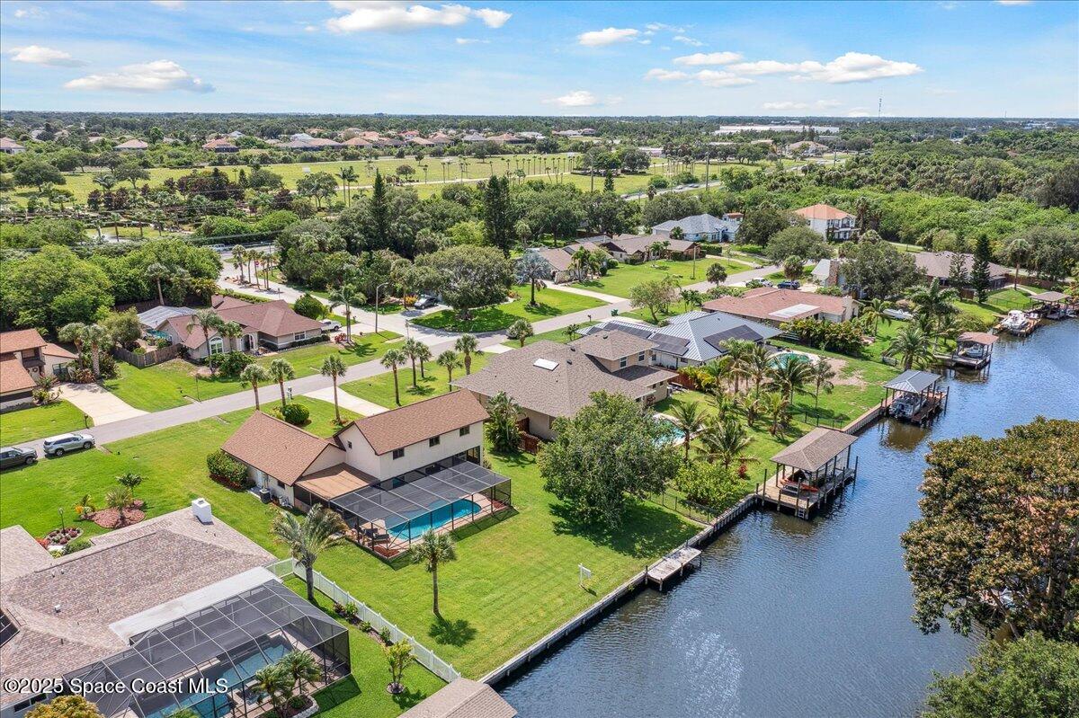 6315 Anchor Lane Rockledge, FL 32955 - Photo 45 of 52 an aerial view of a house with a garden