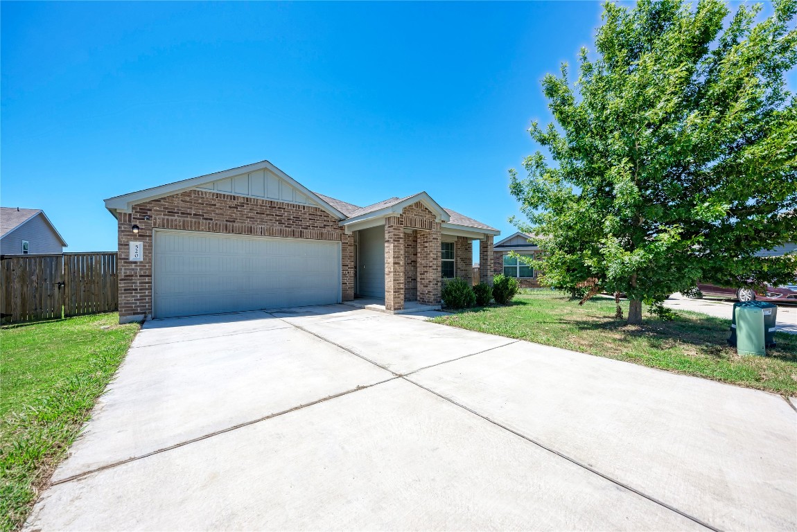 520 Pandora Cove Jarrell, TX 76537 - Photo 1 of 1 a front view of house with yard and green space