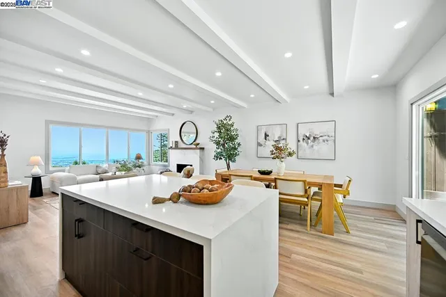 a kitchen with a sink a counter space and appliances